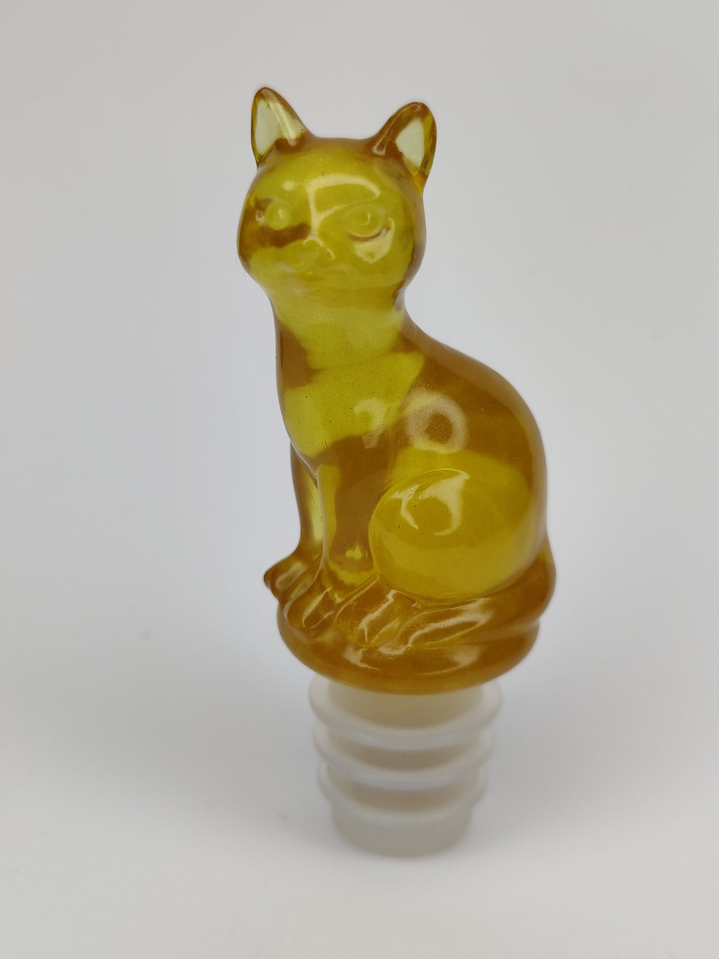 Viinipullon korkkikissa, kulta