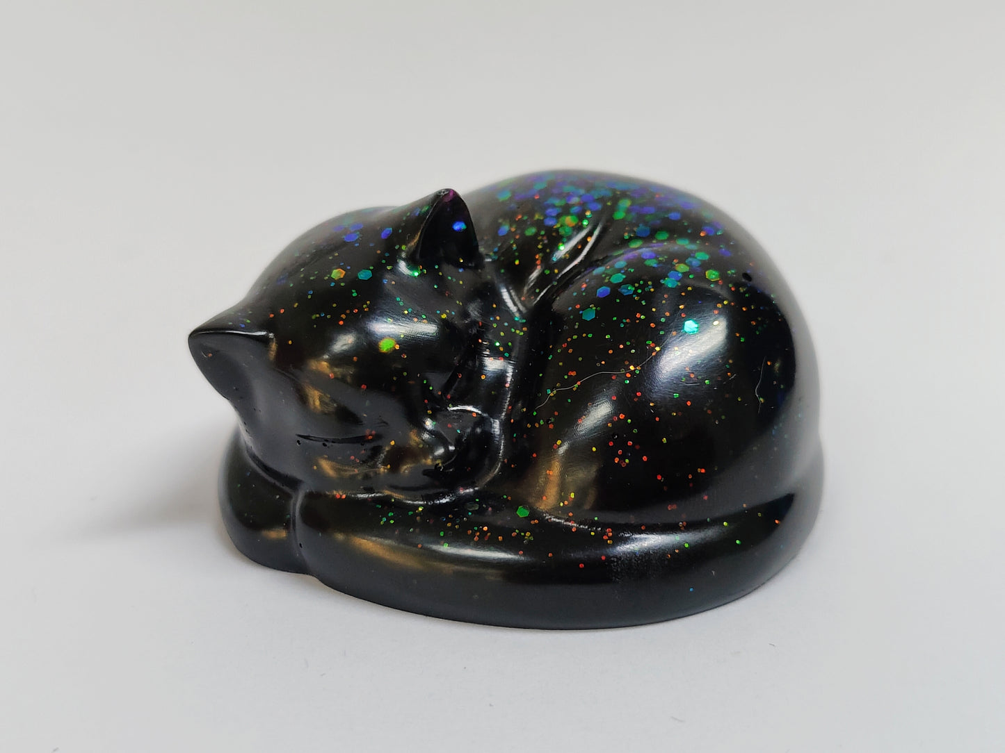 Ikiunta Uinuva kissapatsas, musta ja värikäs glitter