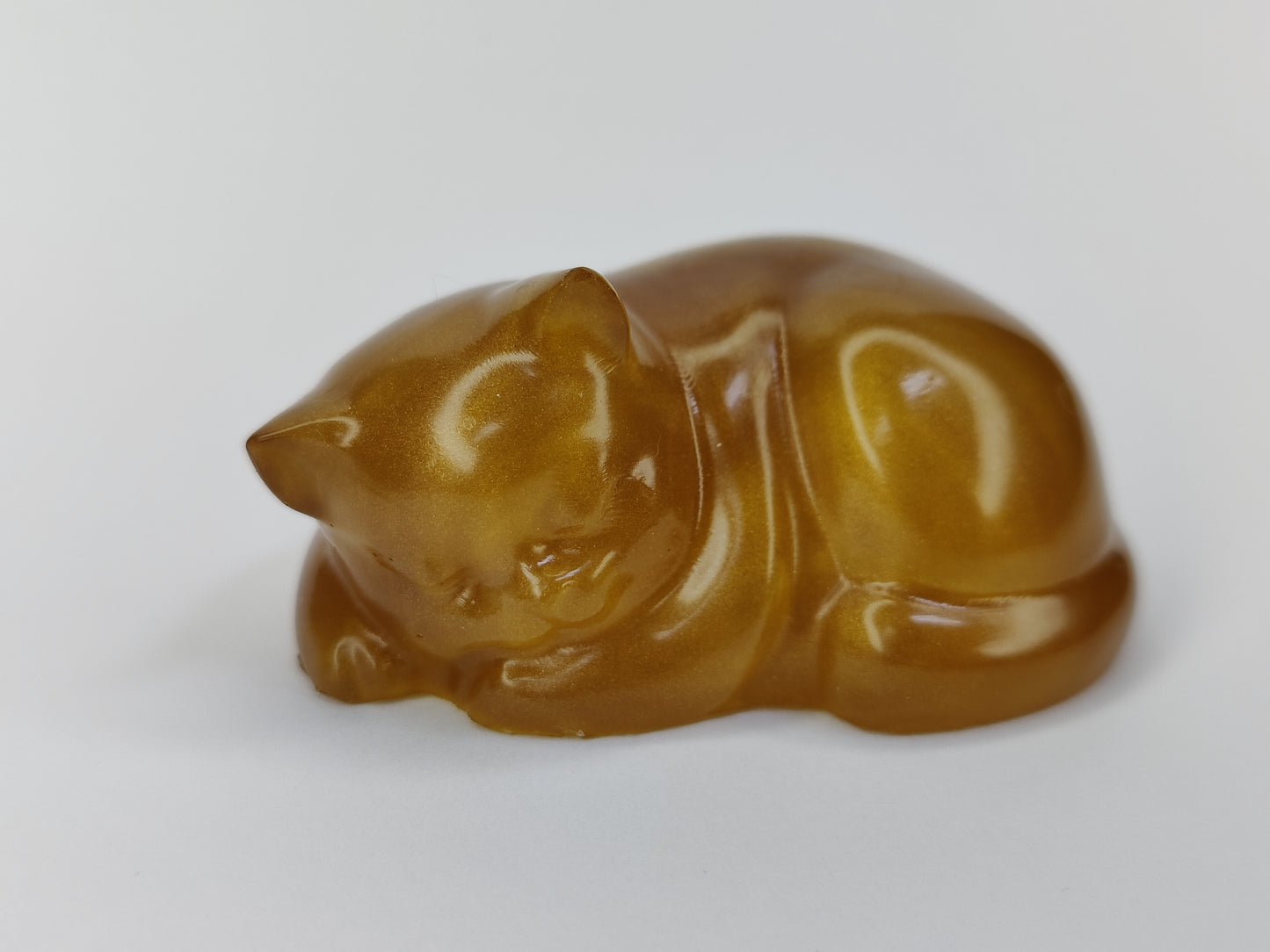 Ikiunta Uinuva kissapatsas, kulta