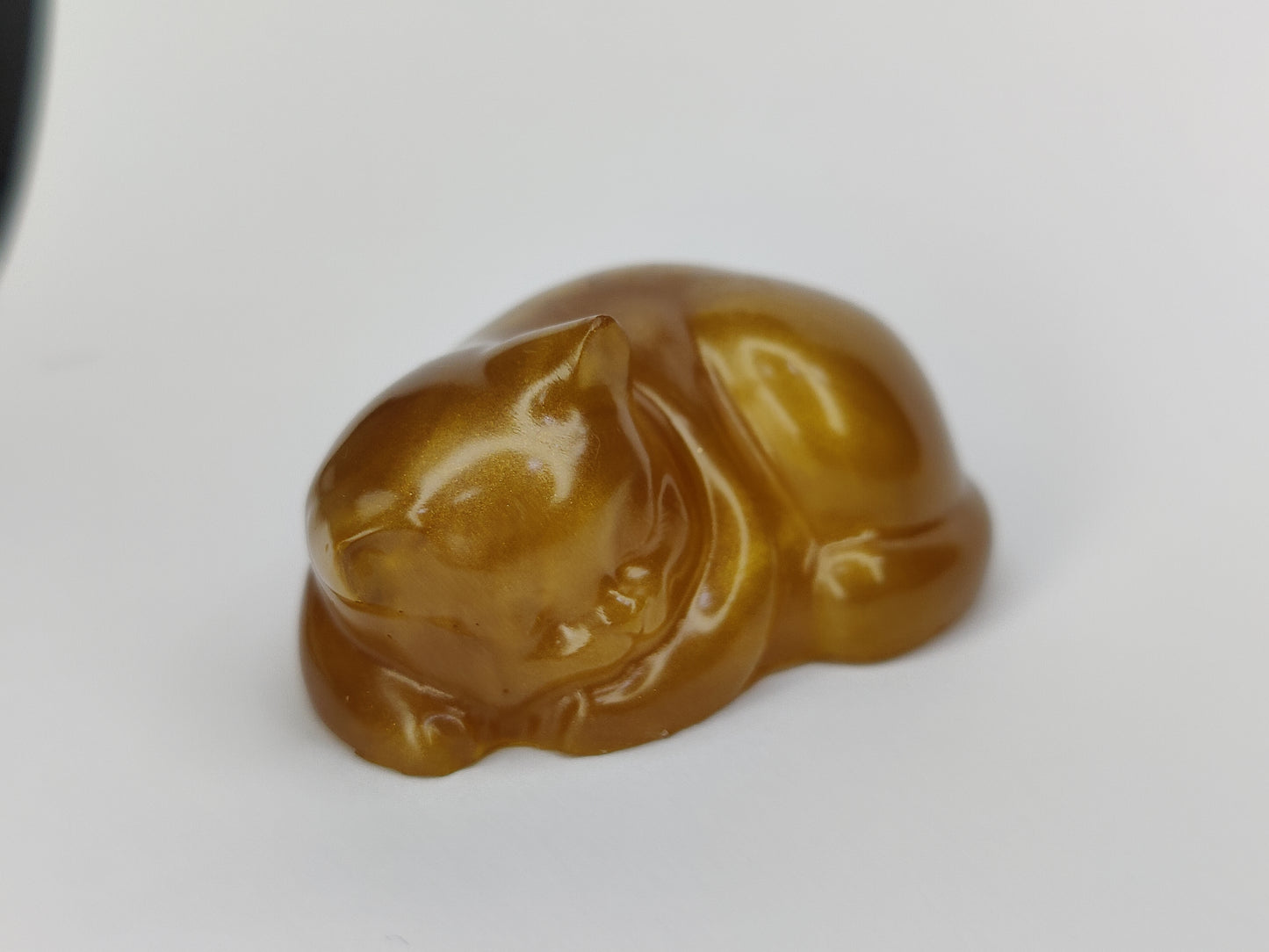 Ikiunta Uinuva kissapatsas, kulta