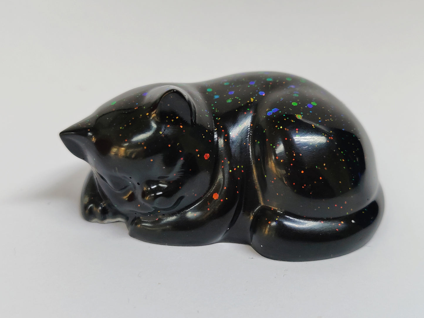 Ikiunta Uinuva kissapatsas, musta ja värikäs glitter