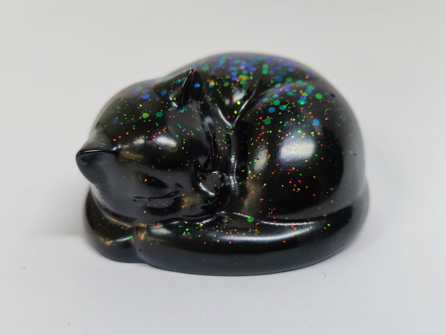 Ikiunta Uinuva kissapatsas, musta ja värikäs glitter