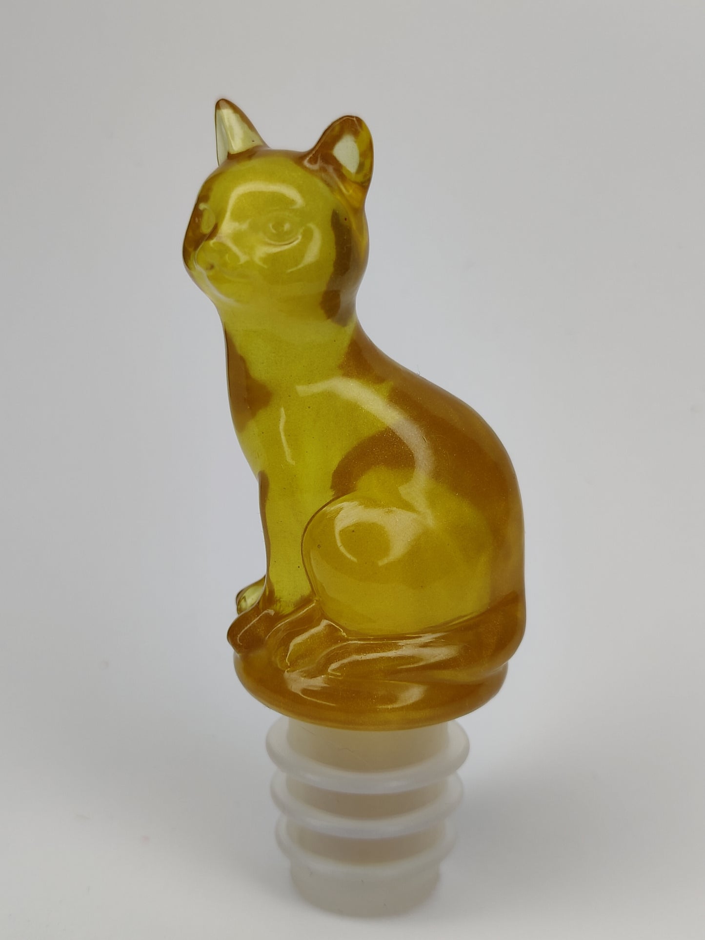 Viinipullon korkkikissa, kulta